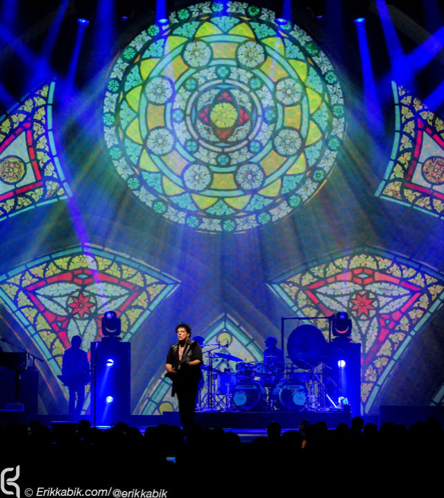 Neal Schon Play guitar in front of Stained Glass Setting AR